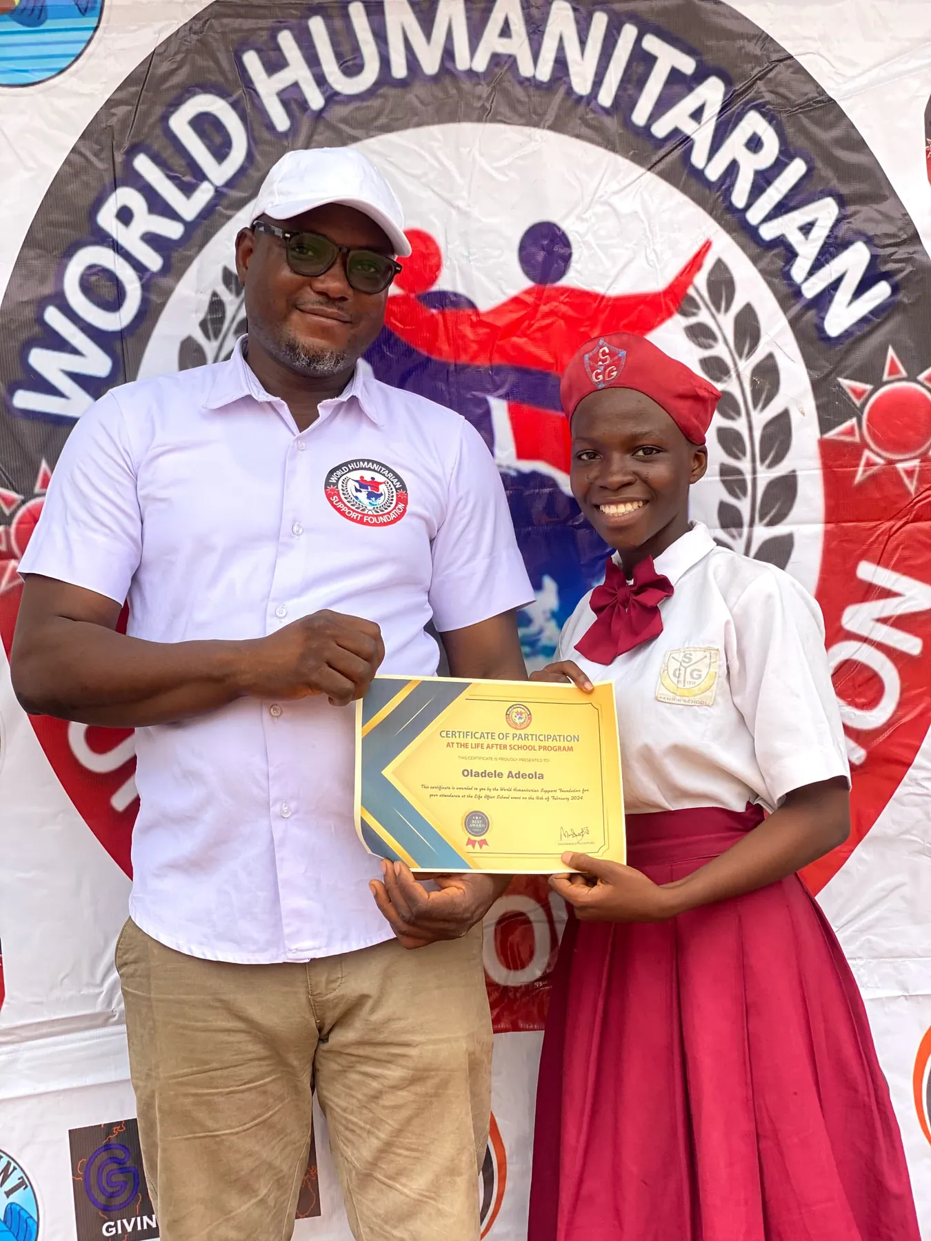 Girls in ICT participant receiving a certificate