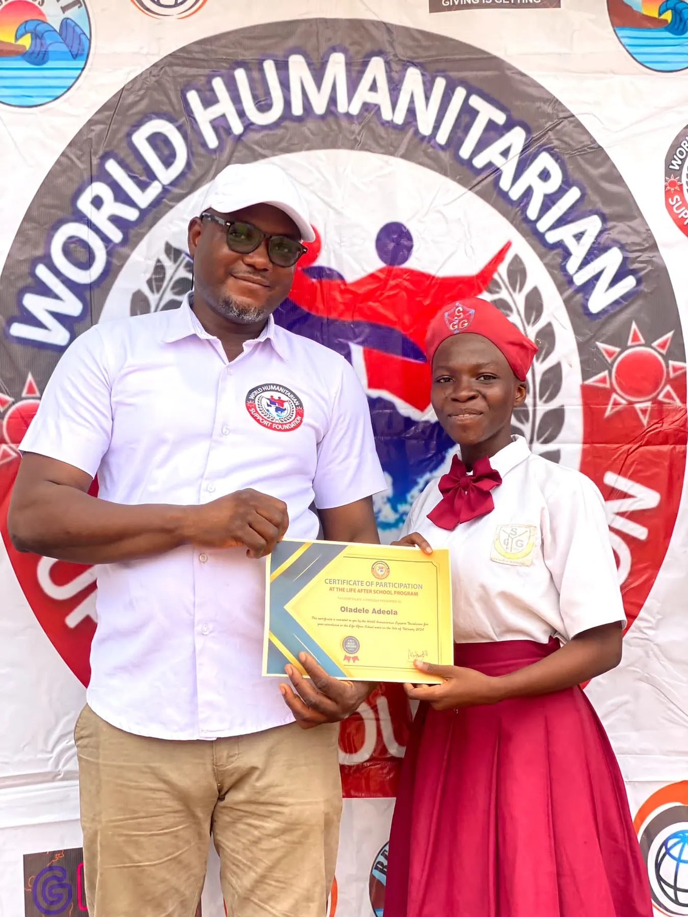 Girls in ICT participant displaying a programme certificate