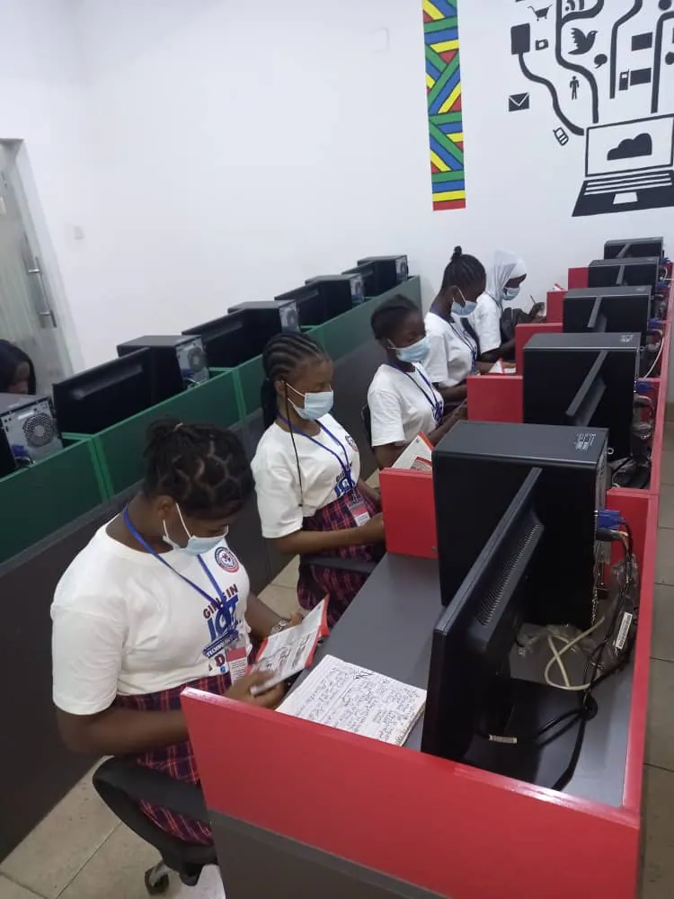 Girls learning at desktop computers during STEM education