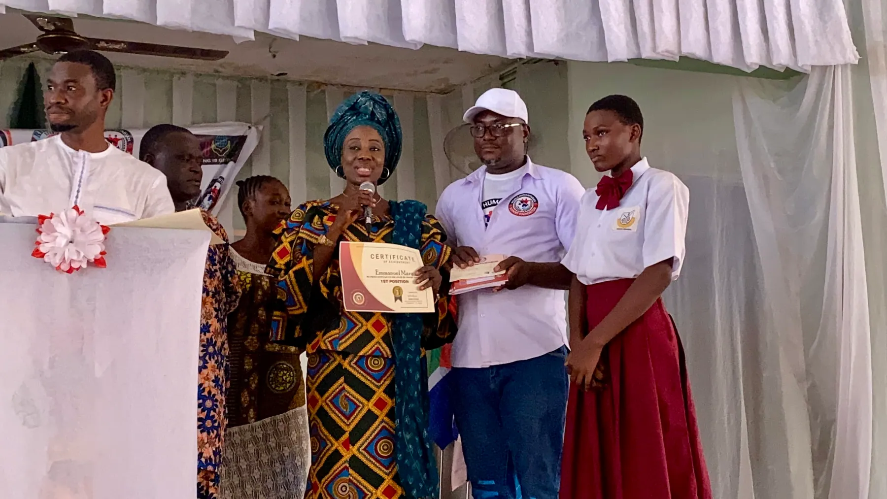 Student receiving recognition during a WHSF-supported programme