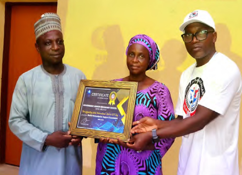 WHSF presenting a framed recognition certificate to community partners
